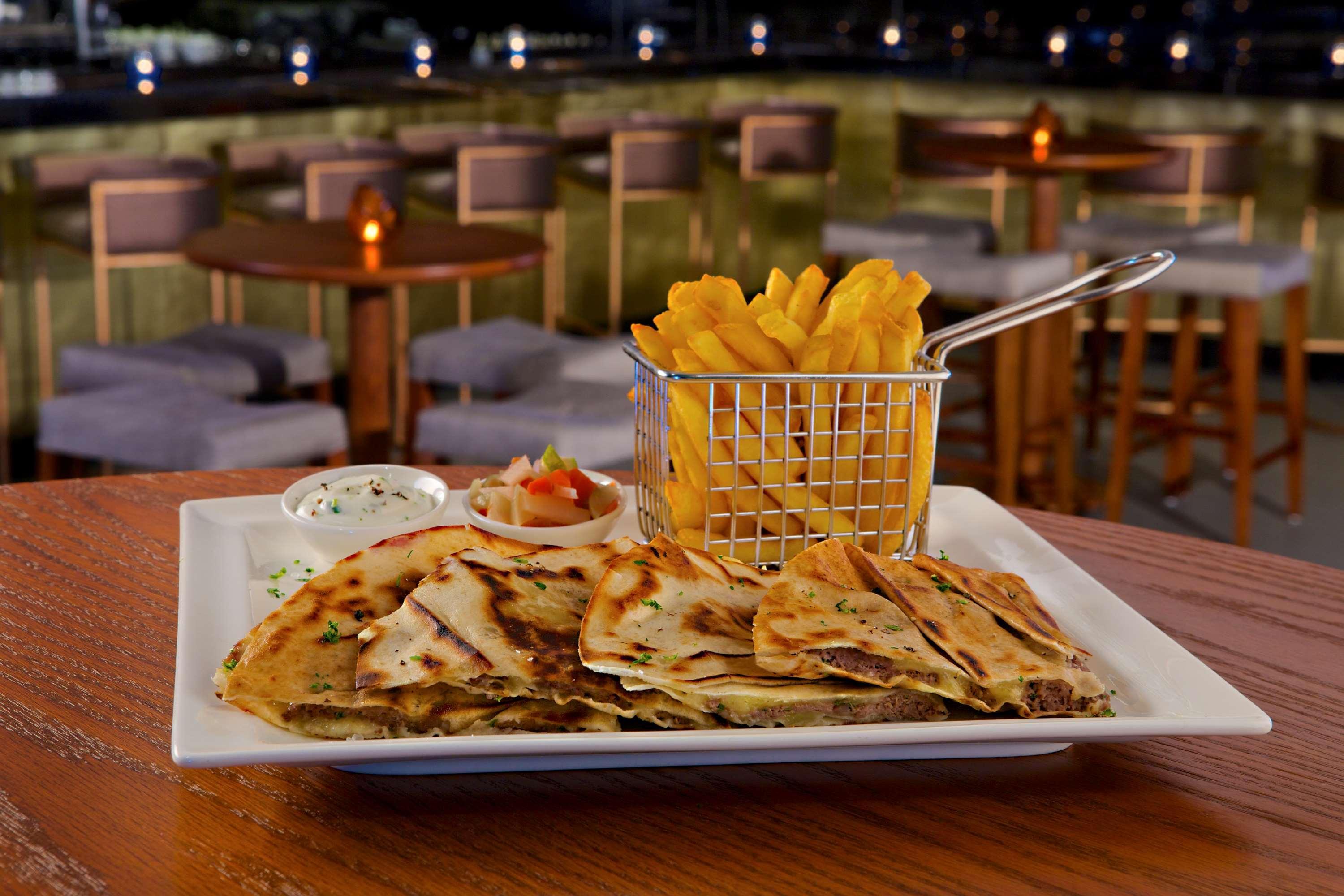 Doubletree By Hilton Resort & Spa Marjan Island Ras al-Khaimah Exterior foto A plate of quesadillas
